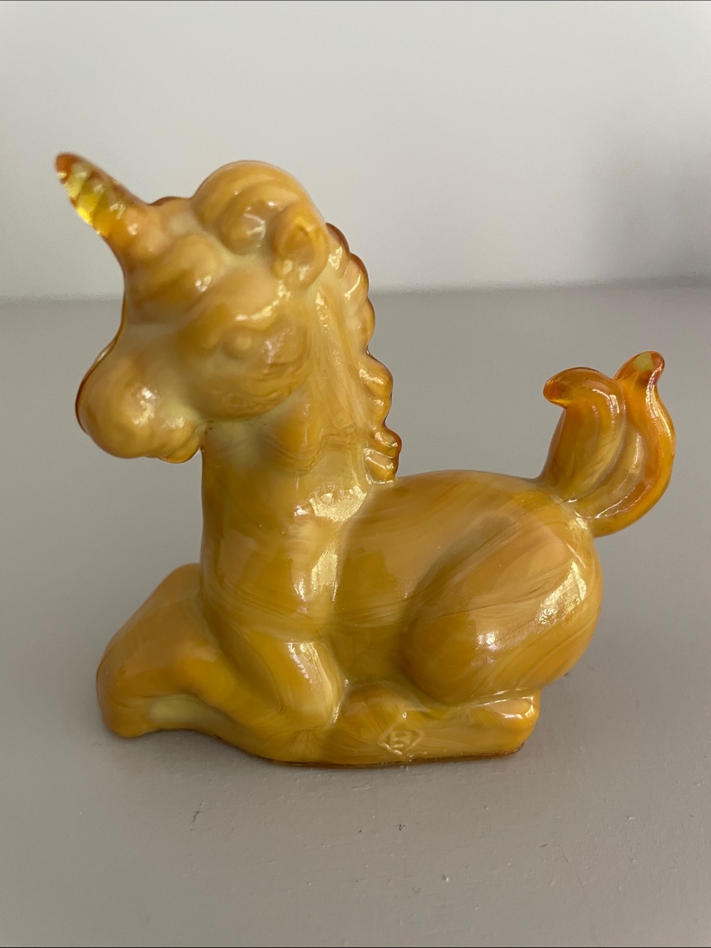 Vintage and rare Boyd glass unicorn-Dijon color.